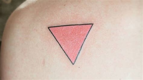 pink triangle tattoo|triangle wrist tattoo meaning.